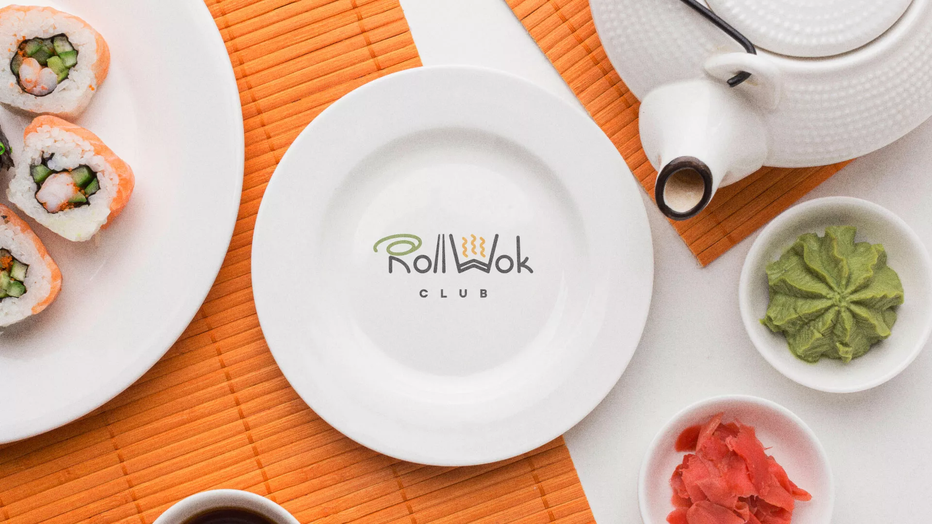 Разработка логотипа и фирменного стиля суши-бара «Roll Wok Club» в Малгобеке